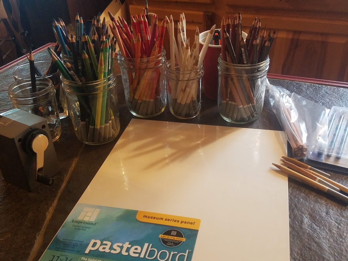 Essential pastel painting supplies including Pastelbord, easels, fixatives, and tools used by Western artist Barby Schacher
